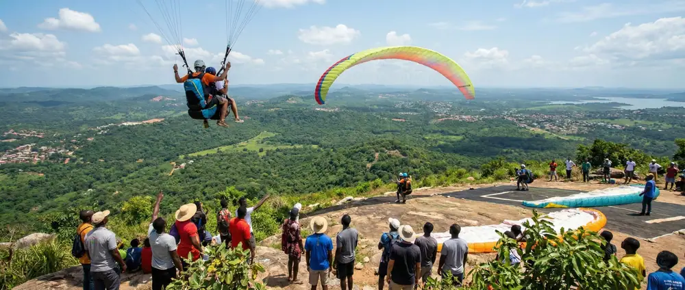 Paraglider launching from Odweanoma Mountain
